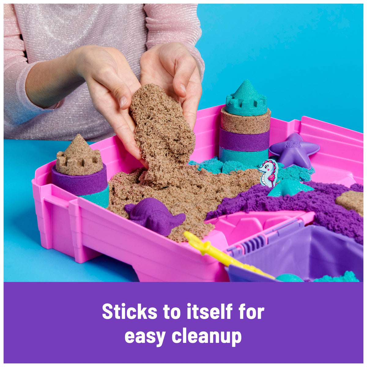 Kinetic Sand Mermaid Palace Playset folding sandbox keeps play contained and easy to store.