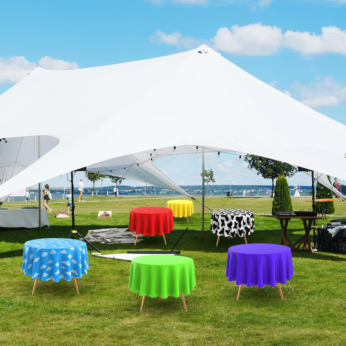 Kinlop blue cow-pattern tablecloth protects surfaces during family dinners.