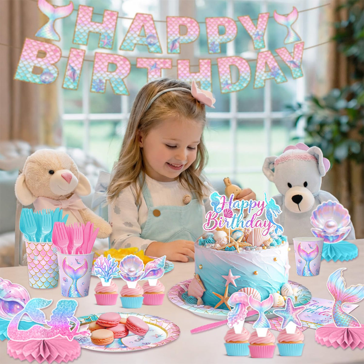 Kinovo mermaid tablecloth sash toppers and balloons create a cohesive sea look