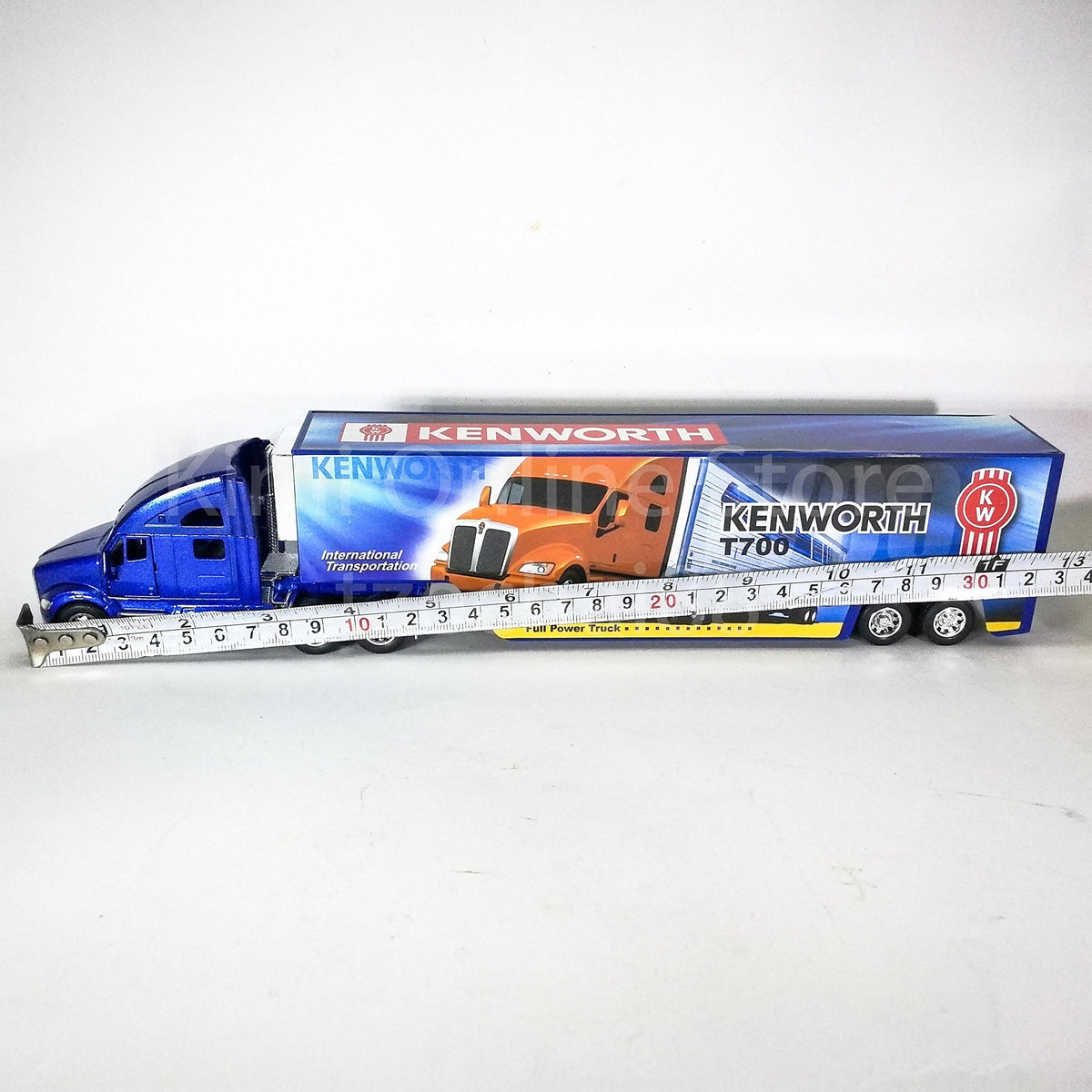 Openable doors reveal a detailed cab interior for display.