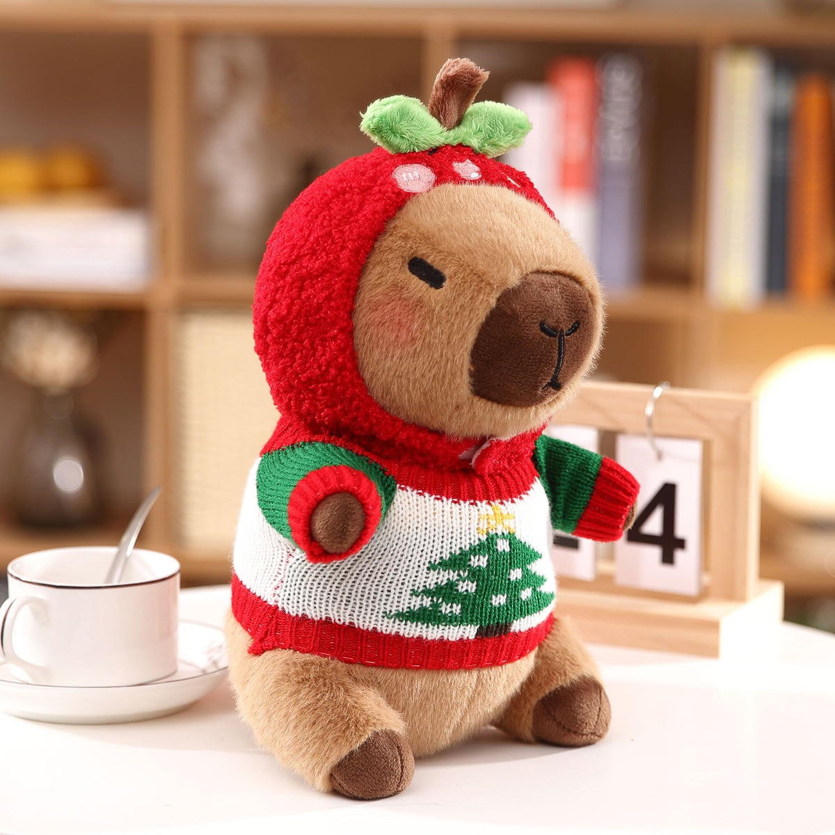 Kireidane capybara plush being dressed up in dress-up session