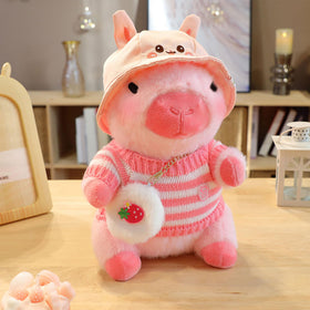Capybara plush dress-up set lets kids mix hats, sweaters, bags