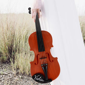 Kisangel violin toy as a decorative piece on desk.