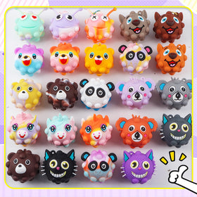 Kiss Monkey animal pop ball eyes pop out for amusing tactile play