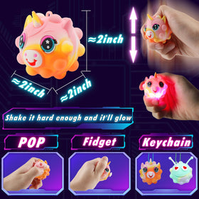 KissFree 2-inch animal pop ball held by child hands