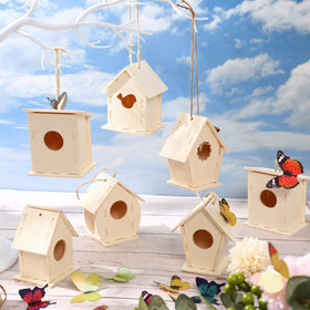 Kisston birdhouse kit ready for painting, perfect as unique party favors and holiday decor.