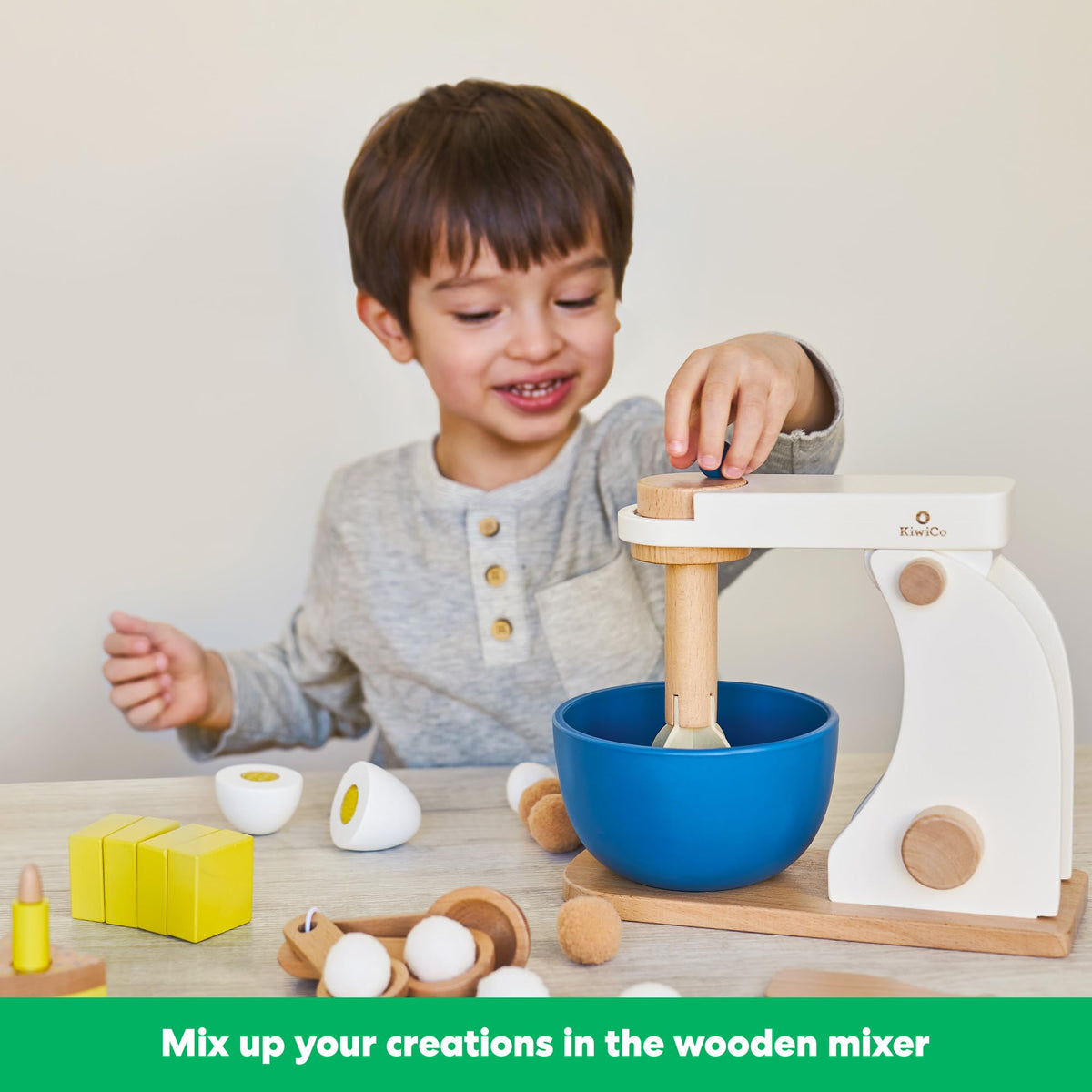 KiwiCo Bake-a-Cake measuring spoons teach measuring concepts in a friendly kitchen.