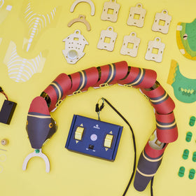 KiwiCo electronics wiring assembly demonstrates powering a snake robot.
