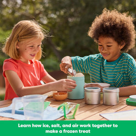 KiwiCo ice cream ingredients station shown with measuring spoons for kid-friendly experiments.
