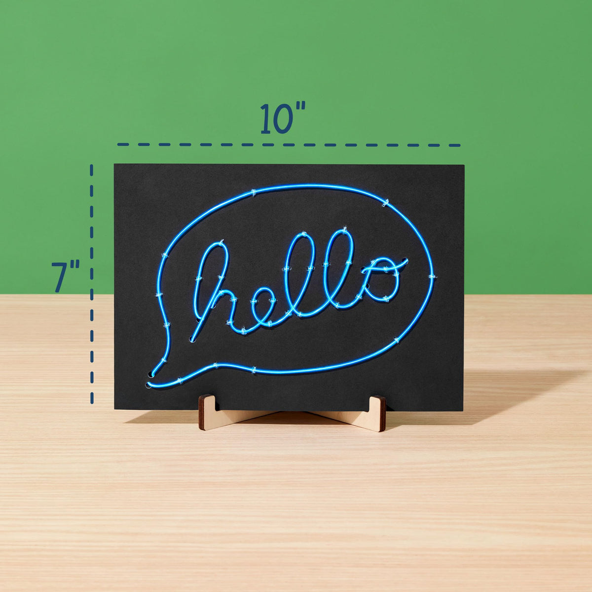 KiwiCo light-up wire art kit two signs displayed ready to hang