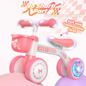 Kkdi pink balance bike indoor play on smooth floor with silent EVA wheels.