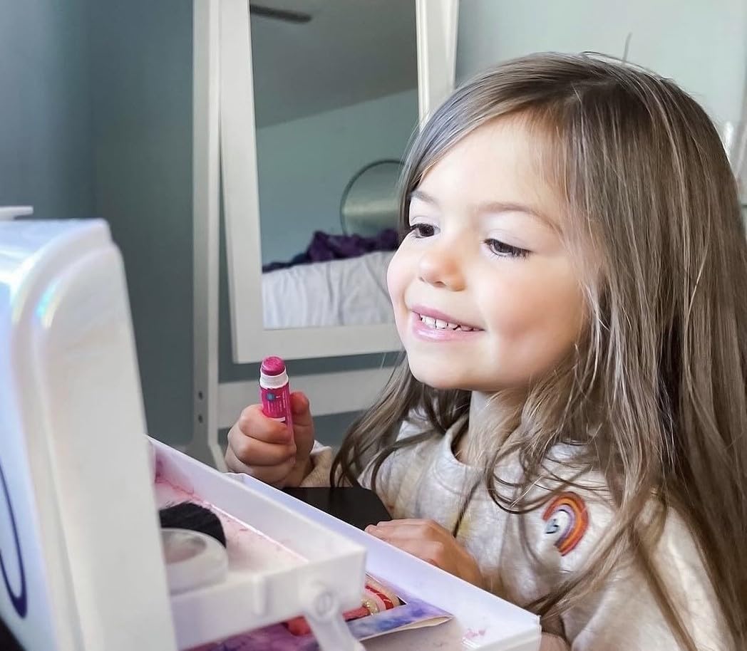 Klee Naturals Luna Star Strawberry lip shimmer adds kid safe shine