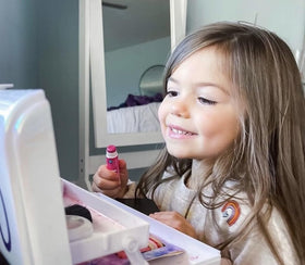 Klee Naturals Luna Star Strawberry lip shimmer adds kid safe shine