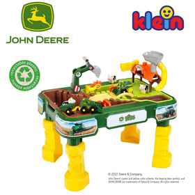 Klein John Deere washing station and stables encourage caring play