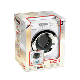Klein Theo Miele washing machine rear hose shows drainage detail for play.