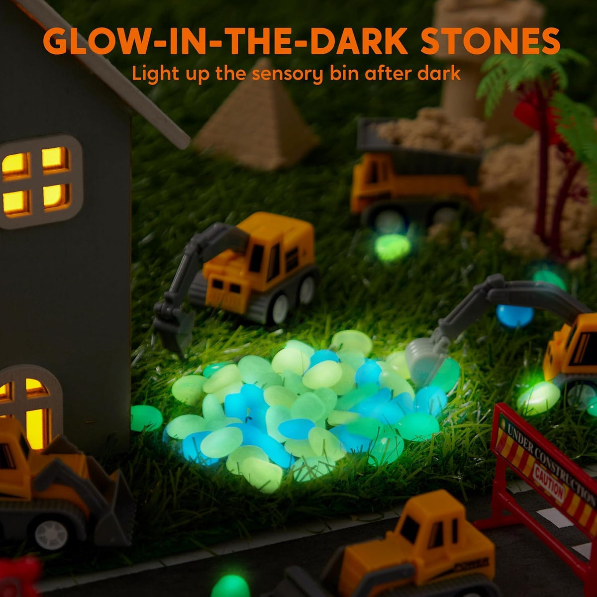 Klever Kits JOVA glow rocks illuminate paths during castle building sessions.