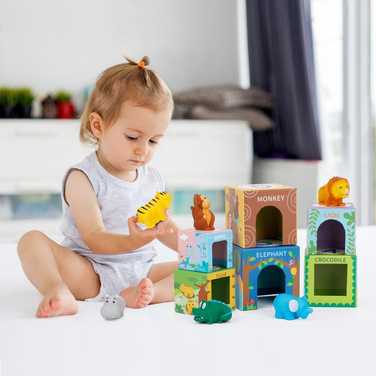 KMTJT stacking block tower visualizes order and size relationships for kids.