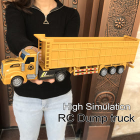 KNACKTOYZ RC dump truck with lights and cab lights for realistic night play.