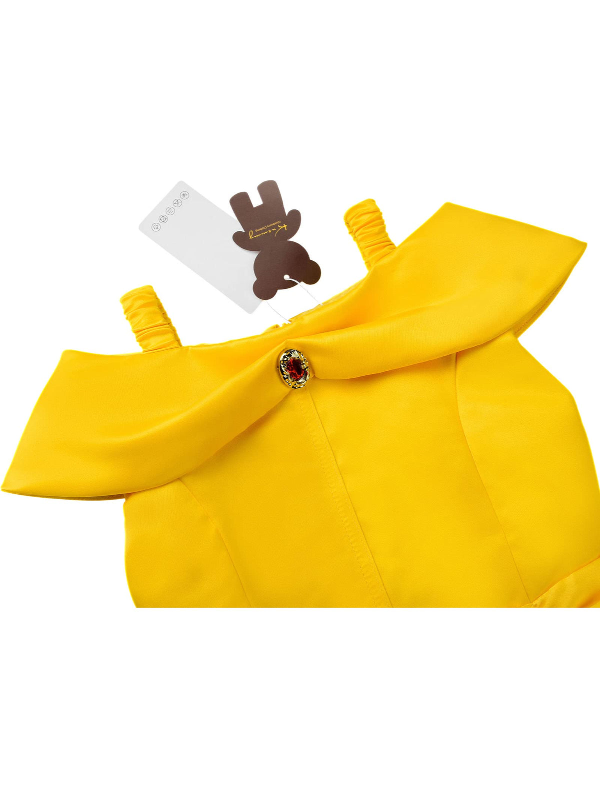 Knemmy center-neckline brooch detail on yellow dress.
