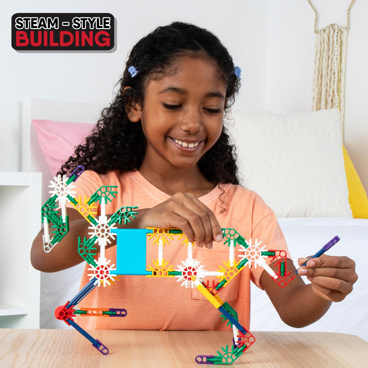K'NEX instruction booklet guiding 40 build ideas for curious minds.