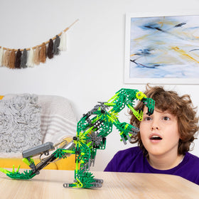 K'NEX Dynamic Dinos Brontosaurus assembly encouraging careful building and imagination.