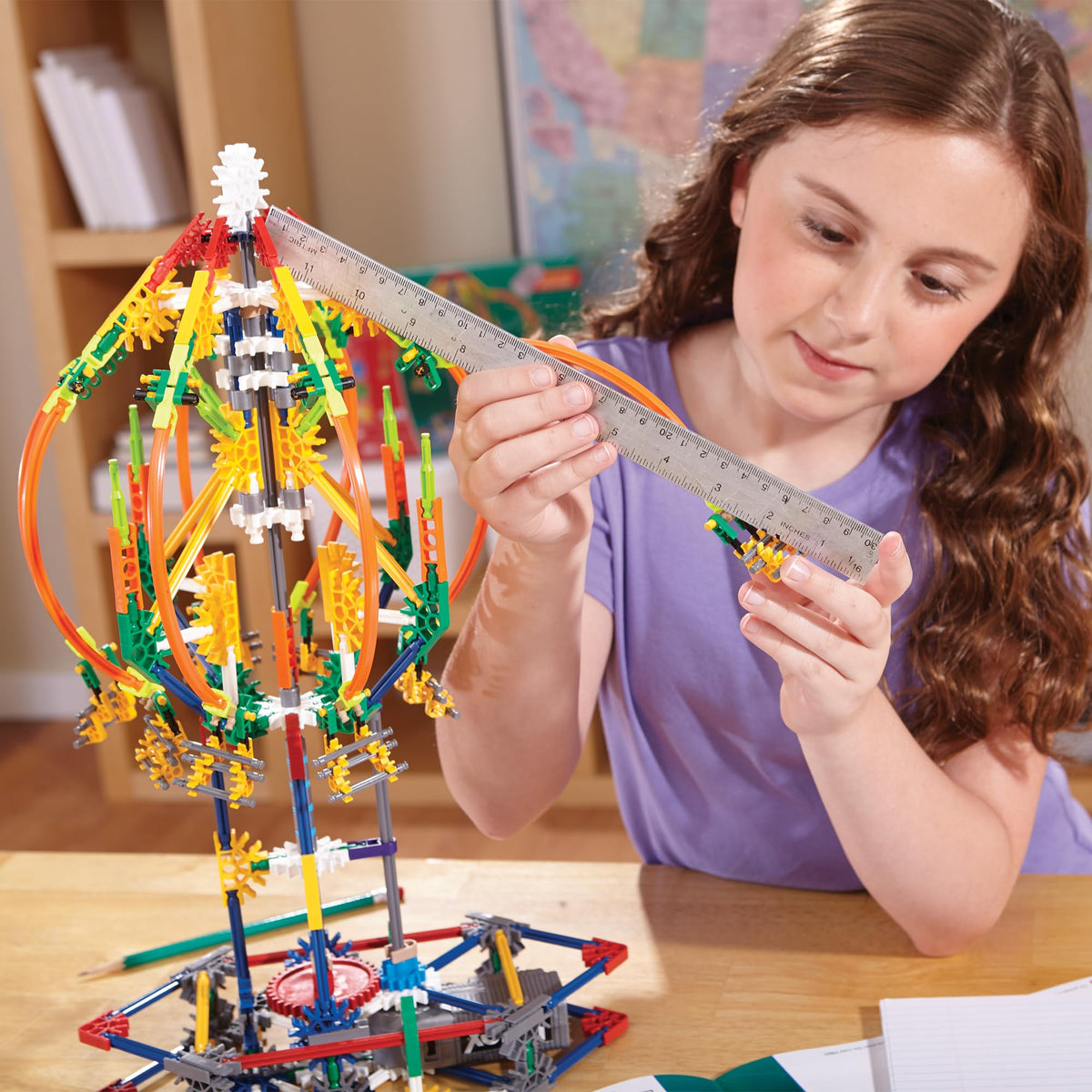 K'NEX boom ride model showcasing gear systems in a classroom setting.