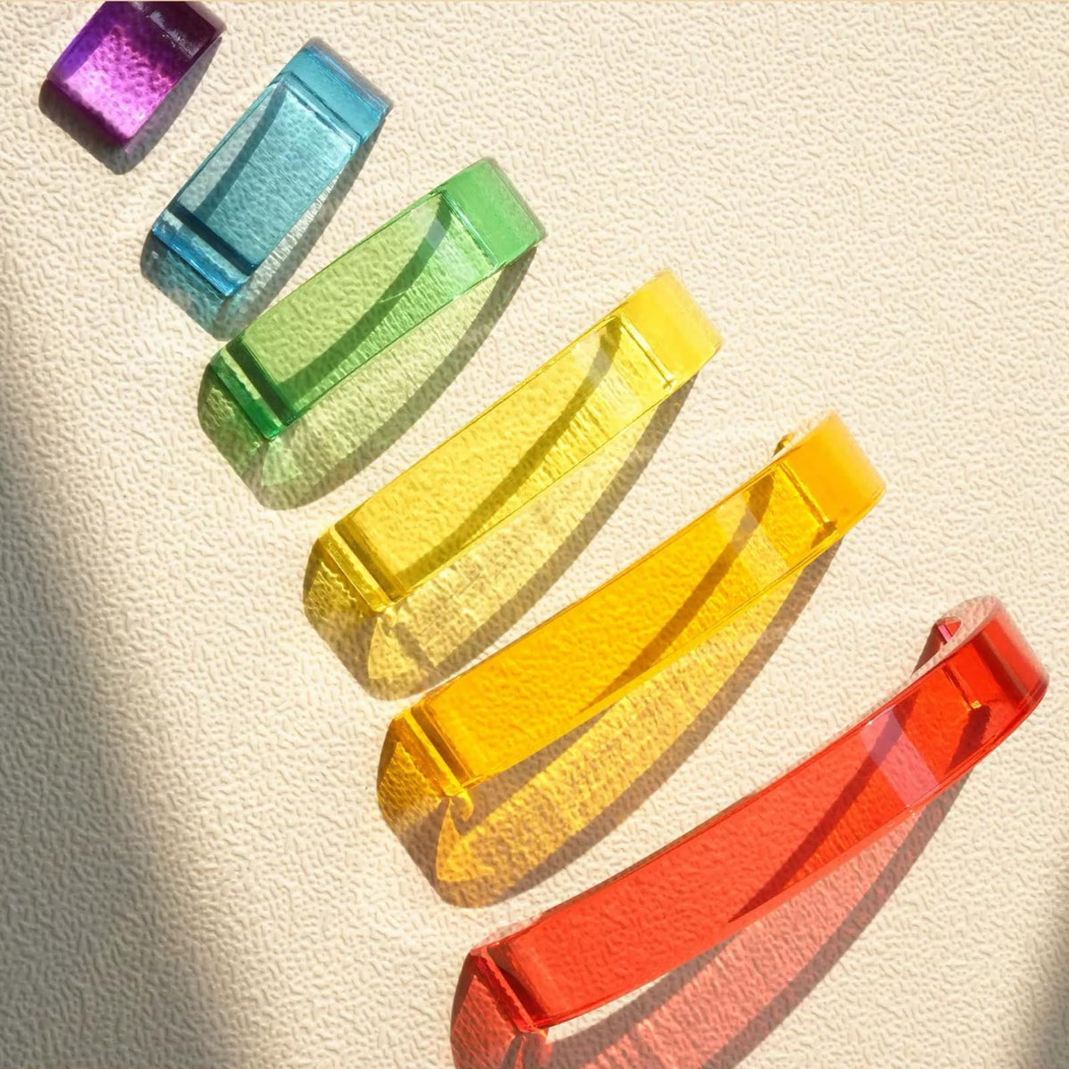 KOAICS arch bridge rainbow closeup showing clear acrylic blocks for tactile learning.