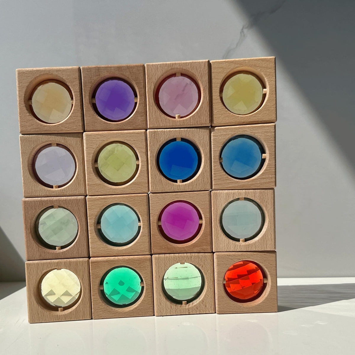 KOAICS window-display gem blocks brightening spaces and inviting color exploration.