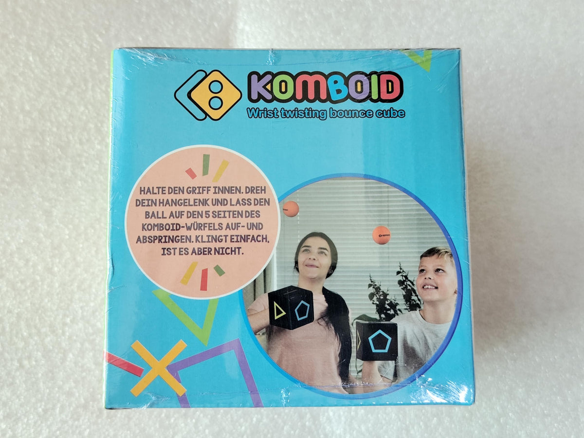 KOMBOID Ball Bouncing Skill Game cube dimensions 11 cm for reference.