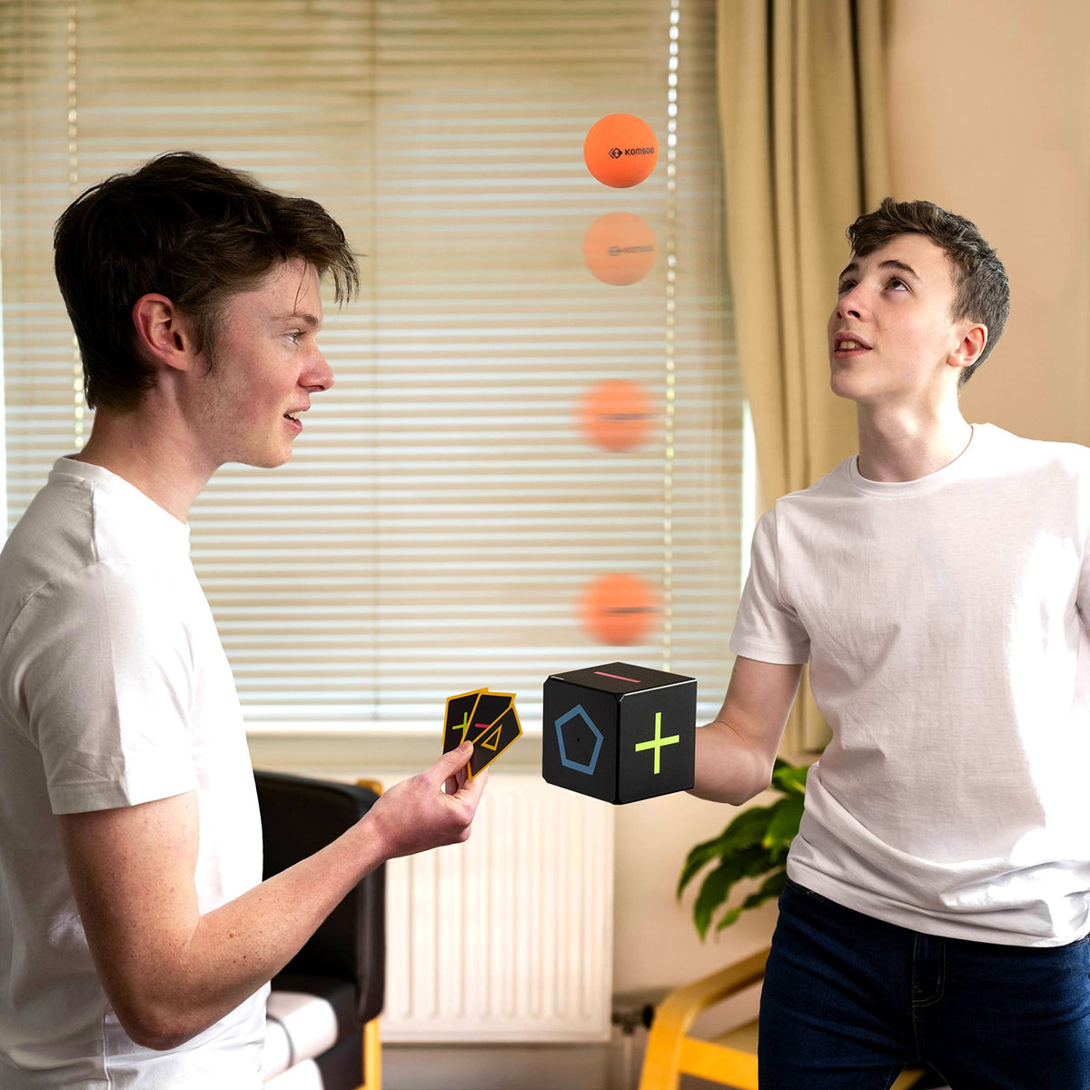 KOMBOID Ball Bouncing Skill Game cube side rotation showing wrist control.