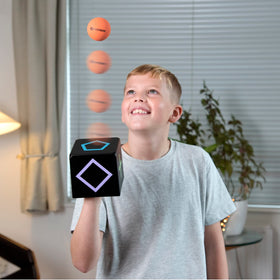 KOMBOID Ball Bouncing Skill Game two balls in action for timing.