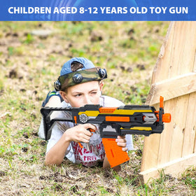 KooRare toy gun demonstrating range up to 50 feet in open space.