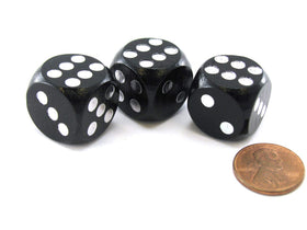 Koplow Games Character Builder Loaded Dice with black bodies and silver pips, ideal for dramatic rolls.