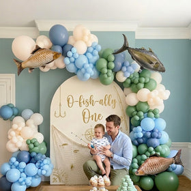 Kozee giant fish foil balloons act as a striking focal point for photos