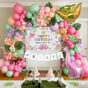 Kozee Three-Rex pink dinosaur balloons create a vibrant party centerpiece.