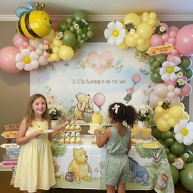 Kozee Winnie arrow signs add playful directions and photo-worthy props.