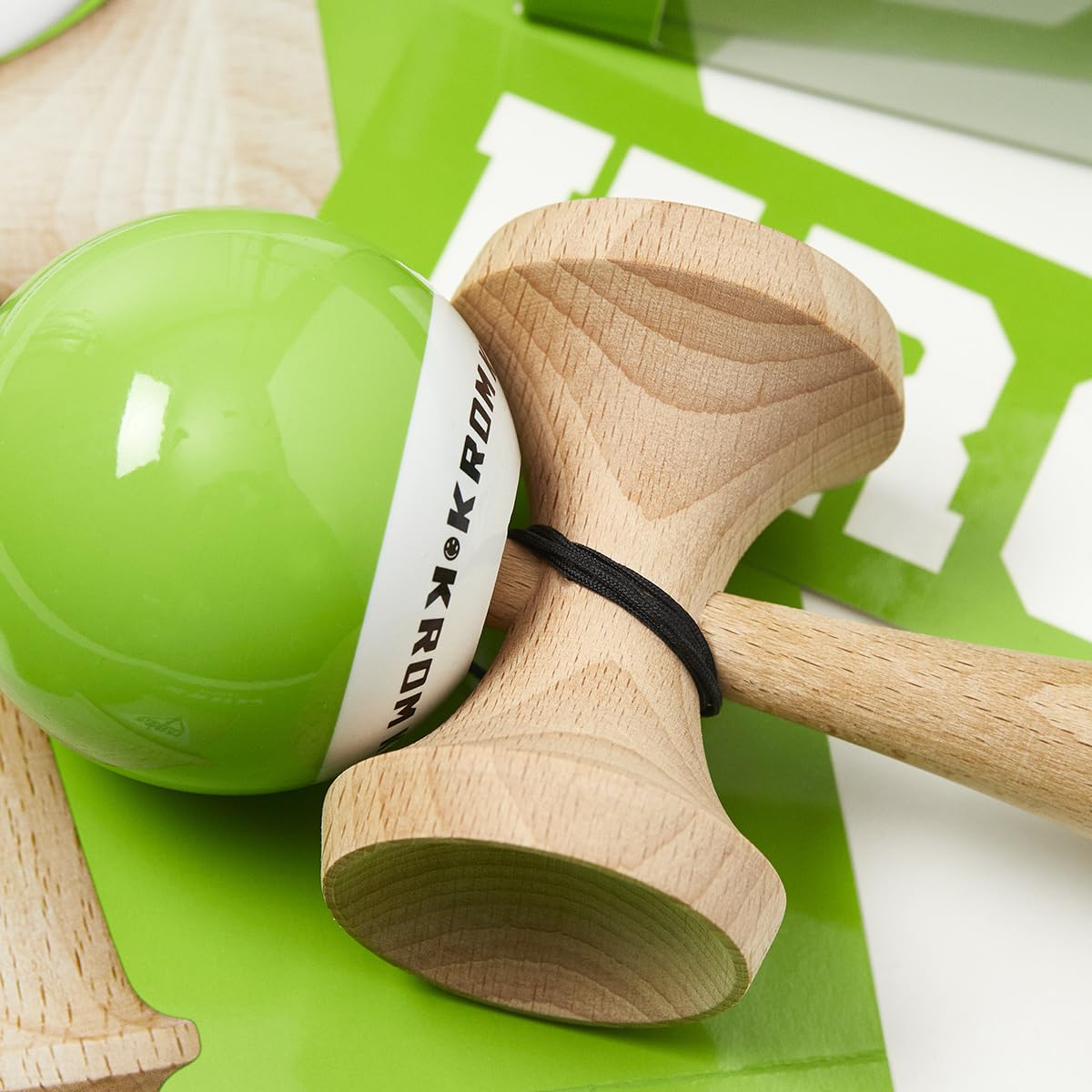 KROM Kendama POP LOL Lime Green bundle with extra string and stickers