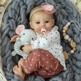 KSBD reborn doll with interchangeable outfits for creative dressing.