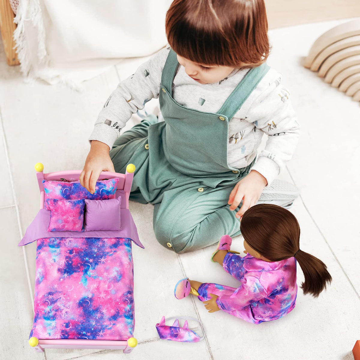 K.T. Fancy doll eye mask completes bedtime role-play.