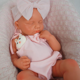 KUICEO Reborn doll face with silicone texture for lifelike newborn aesthetics in play