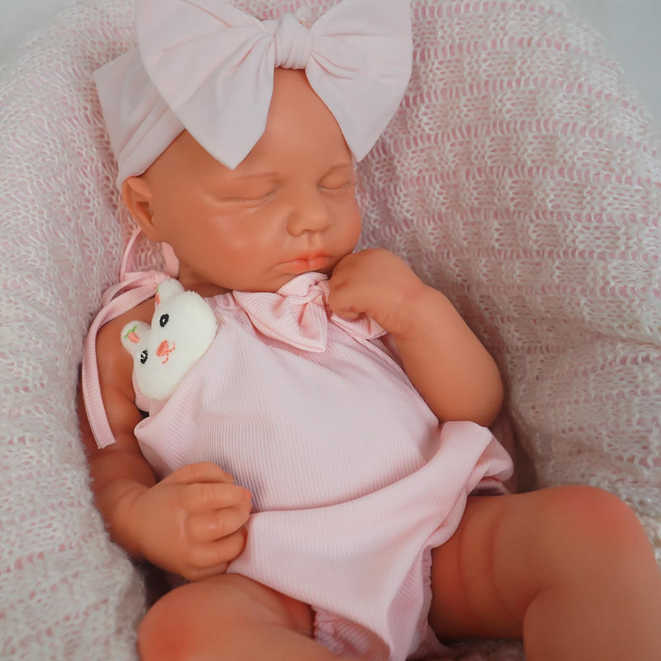 KUICEO Reborn doll face with silicone texture for lifelike newborn aesthetics in play