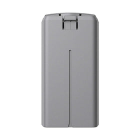 KUWATA intelligent flight battery mounted on a DJI Mini 4K drone for longer flights.