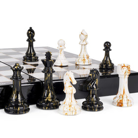Kvintes chrome and metal pieces shine on a durable marbled board