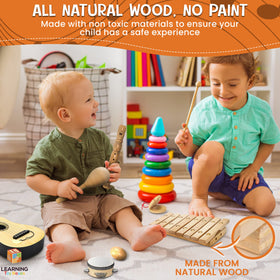 L Learning Toy Boxes egg shaker close-up emphasizes gentle, resonant tones