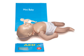 Laerdal Mini Baby Global Set inflatable manikin demonstrates realistic chest rise for CPR practice.