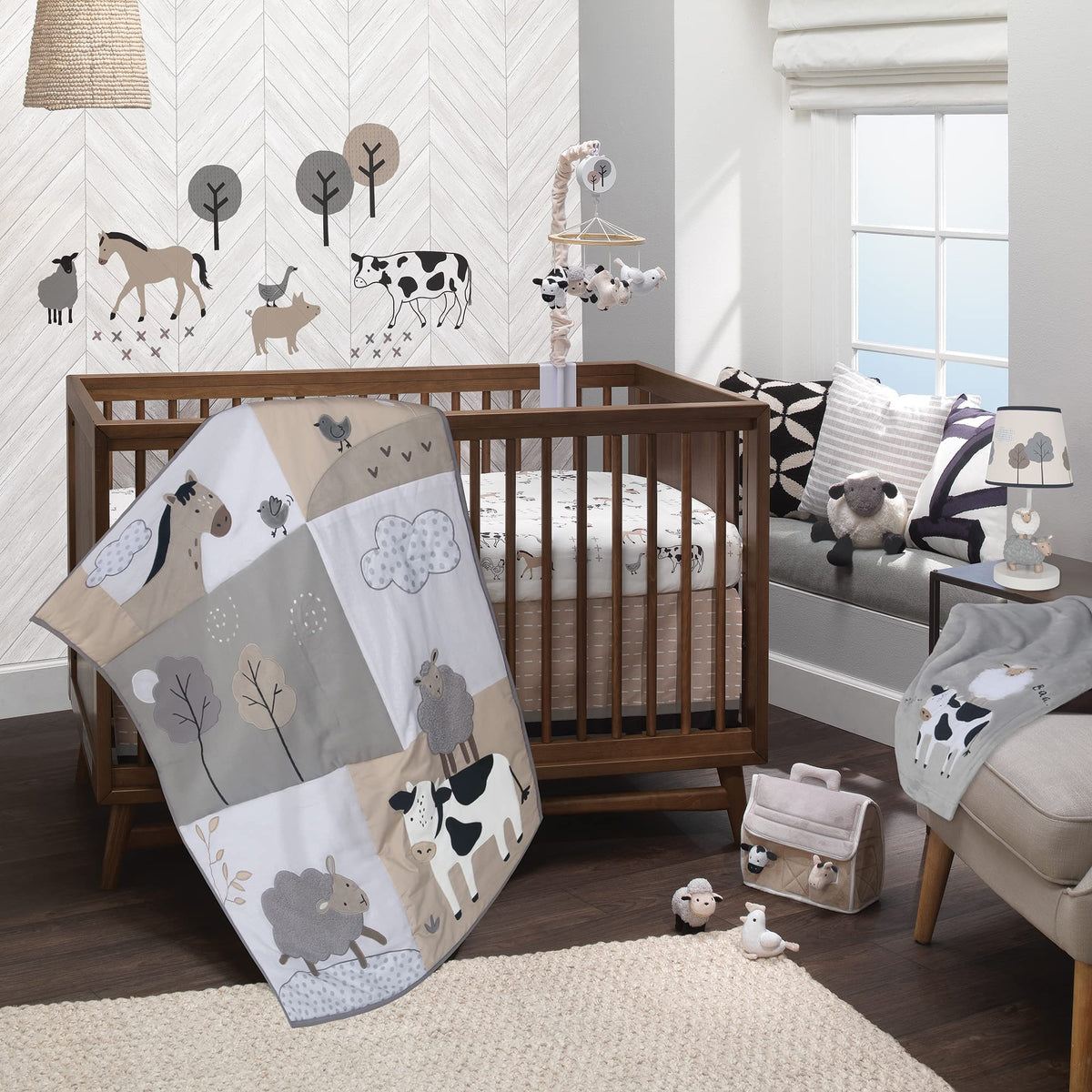 Lambs & Ivy plush barn ready for playtime with four animal friends.