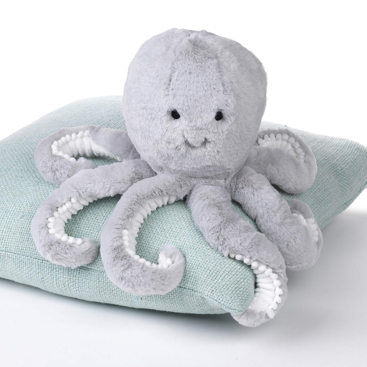 Machine washable Inky octopus plush ready for easy cleanup after adventures