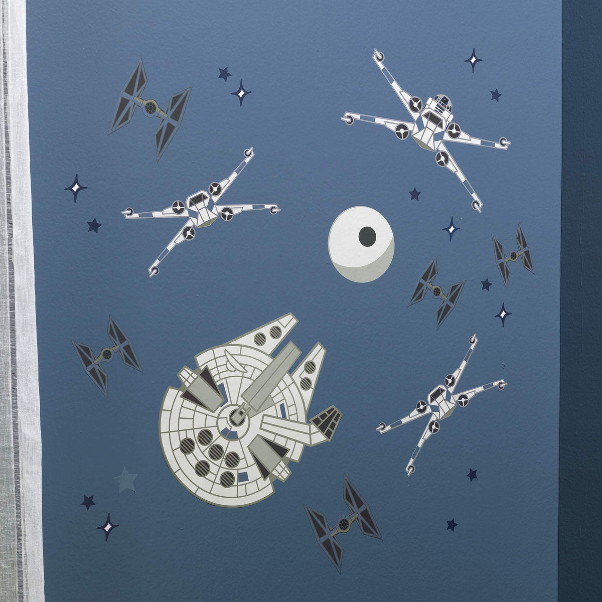 Lambs & Ivy Star Wars Millennium Falcon wall decals for imaginative playtime