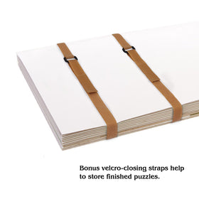 Lavievert two storage straps securing completed puzzles for stacking.