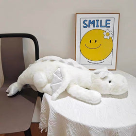 Leahaoe weighted dragon in a cozy bedside setting promotes calm companionship.